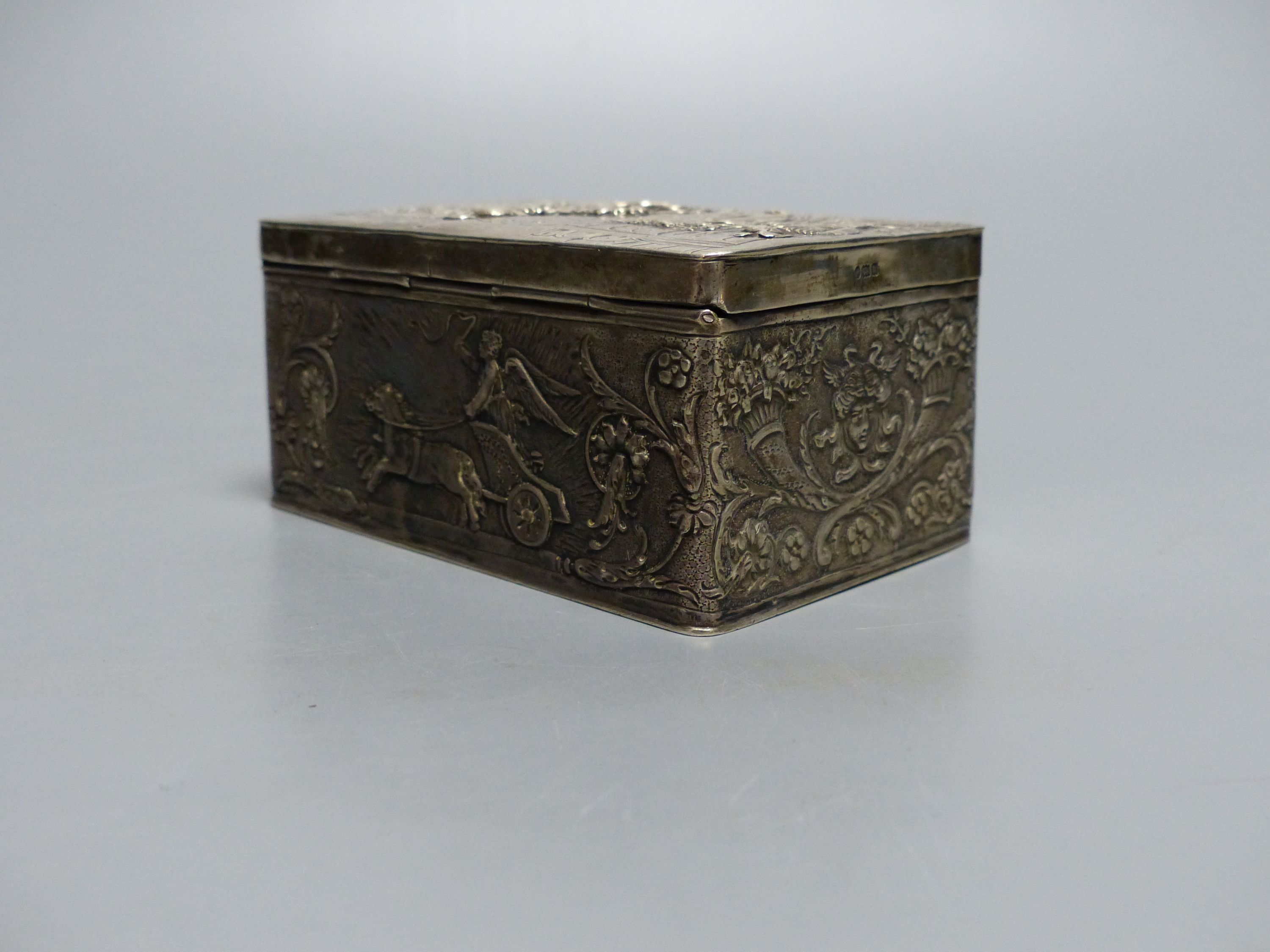 An early 20th century Hanau embossed silver rectangular box with hinged cover, import marks for London, 1902, width 10.7cm,